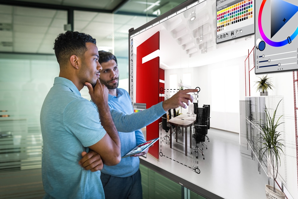 Two Employees Collaborating together in the workplace