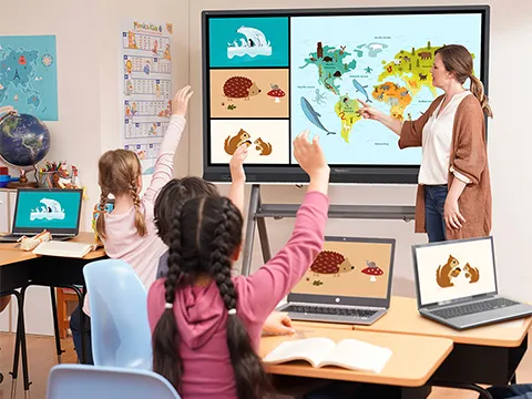 teacher using a ViewBoard to instruct group of children 