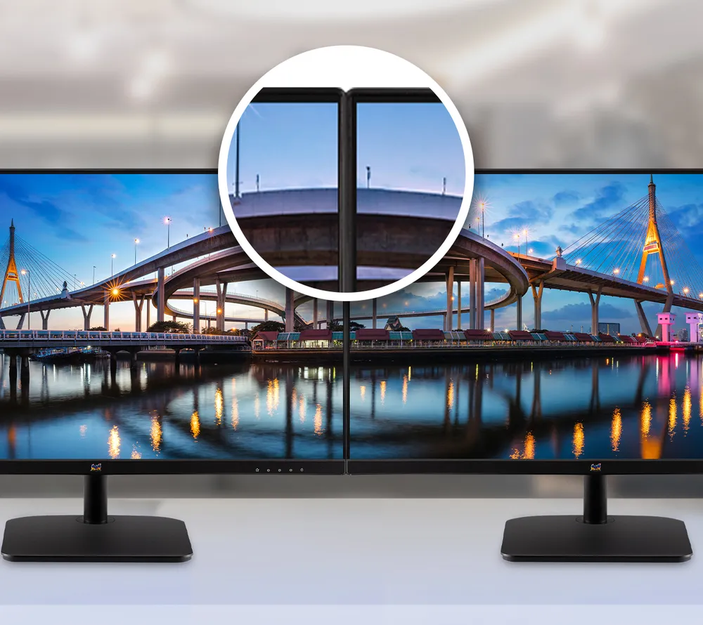 two monitors placed close together showing frameless design