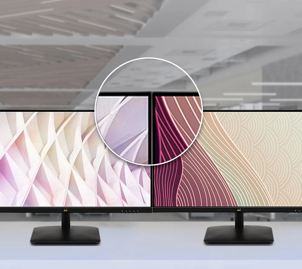 a close up showing the thin bezel between two side-by-side monitors