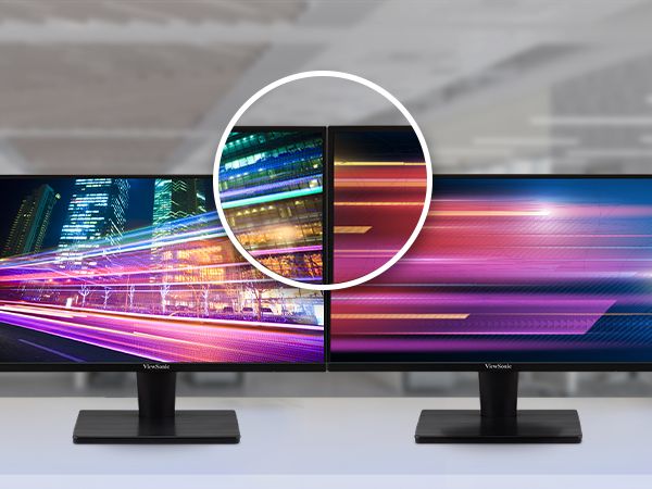 two monitors placed close together showing frameless design