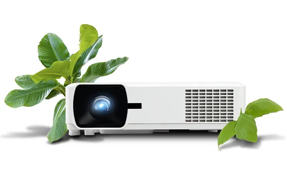 a projector next to a plant leaves