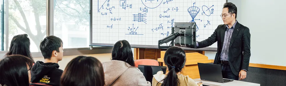 instructor using a ViewSonic ID2456 to teach students