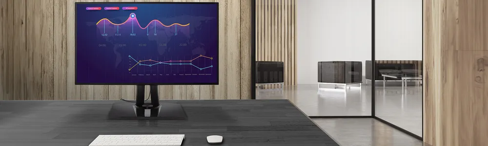 a monitor with a graph in an office