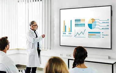 a doctor presenting to other doctors