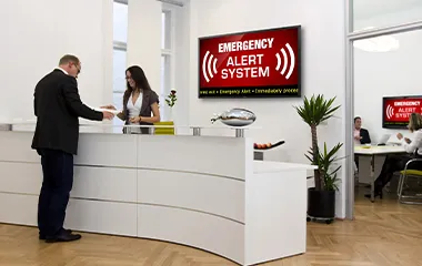 an emergency alert shown on a lobby screen