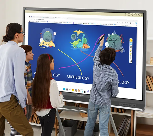 a teacher watches as students use the touch screen on a viewboard