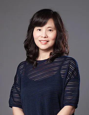 headshot of bonny cheng in two layers, with a sheer top